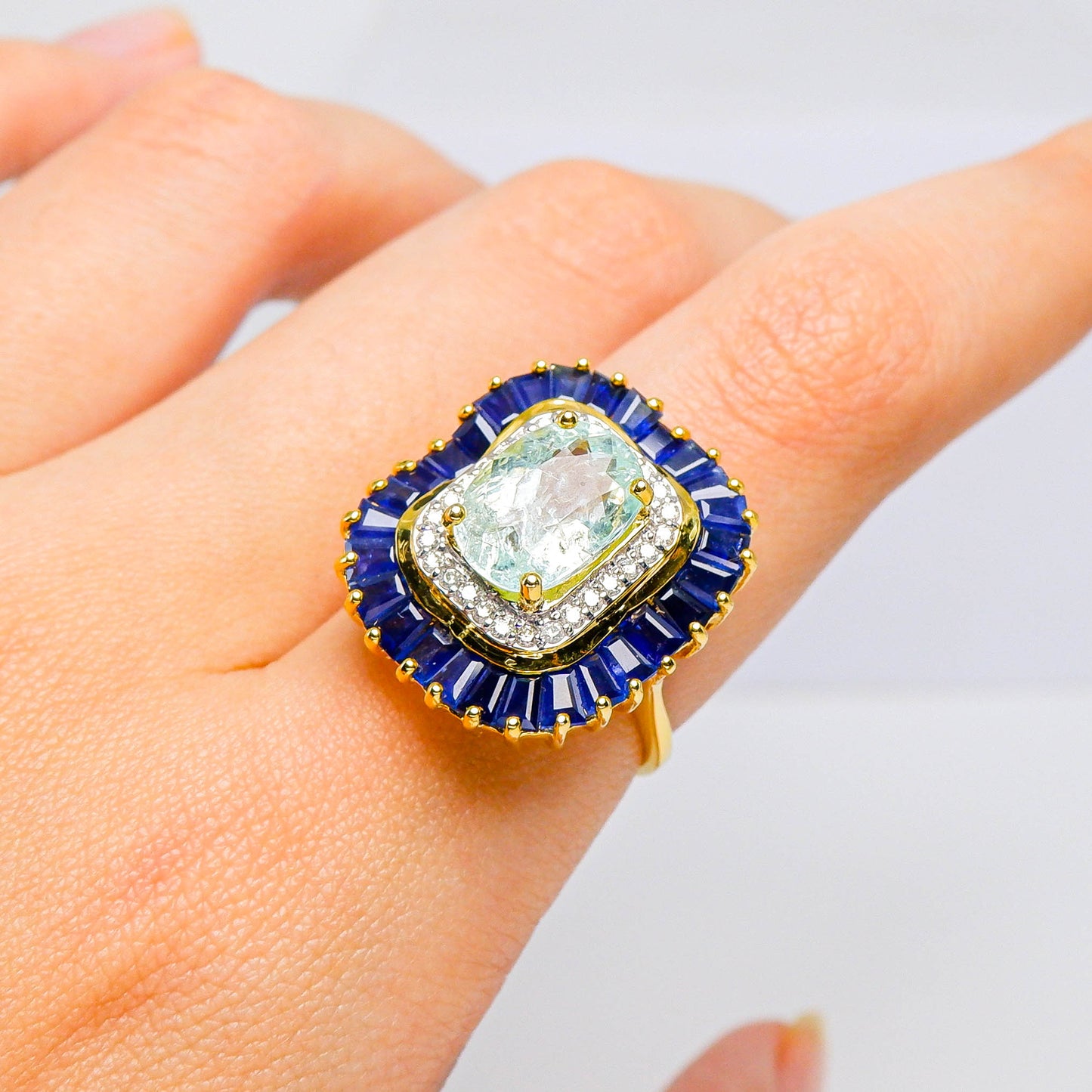 แหวนทอง9K ฝังพลอย พาไรบ้าทัวร์มาลีน (fancy sapphire) + ไพลินกาญจนบุรี (blue sapphire) + เพชร (Diamond)