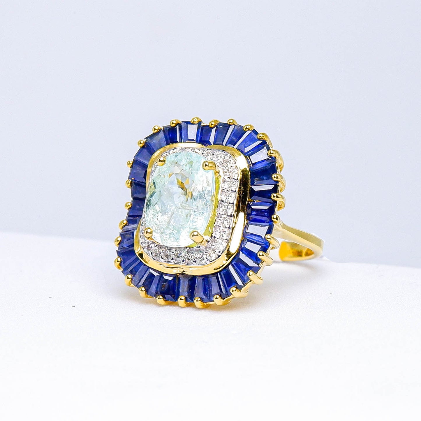 แหวนทอง9K ฝังพลอย พาไรบ้าทัวร์มาลีน (fancy sapphire) + ไพลินกาญจนบุรี (blue sapphire) + เพชร (Diamond)